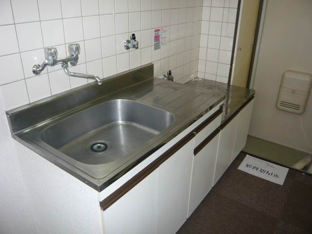 Kitchen. It boasts a large kitchen