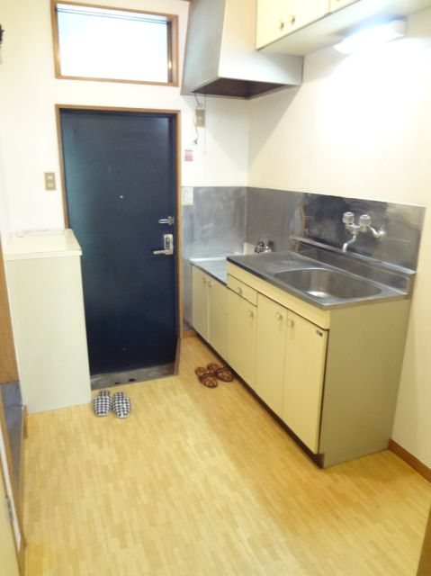 Living and room. It is around the kitchen