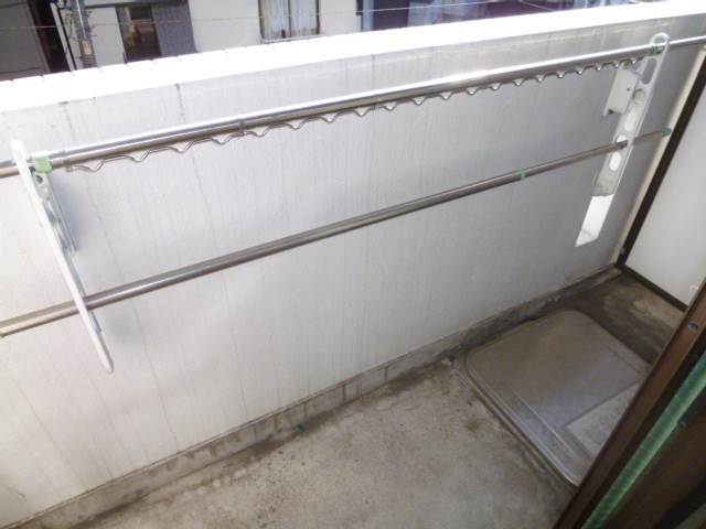 Balcony. Jose and laundry.