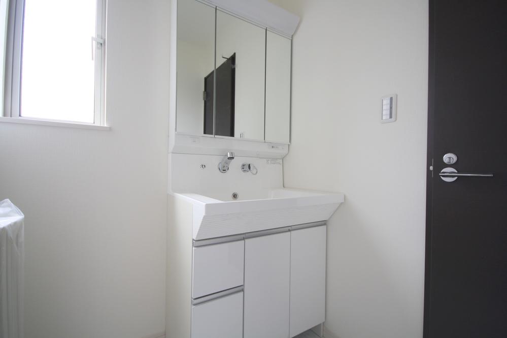 Wash basin, toilet. Local Photos