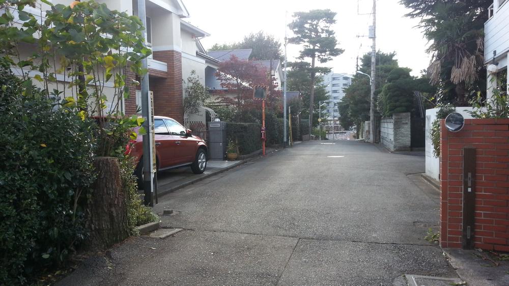 Local photos, including front road. It is a quiet residential area. 