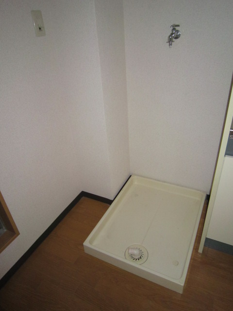 Other room space. Young popular Washing machine in the room for those!