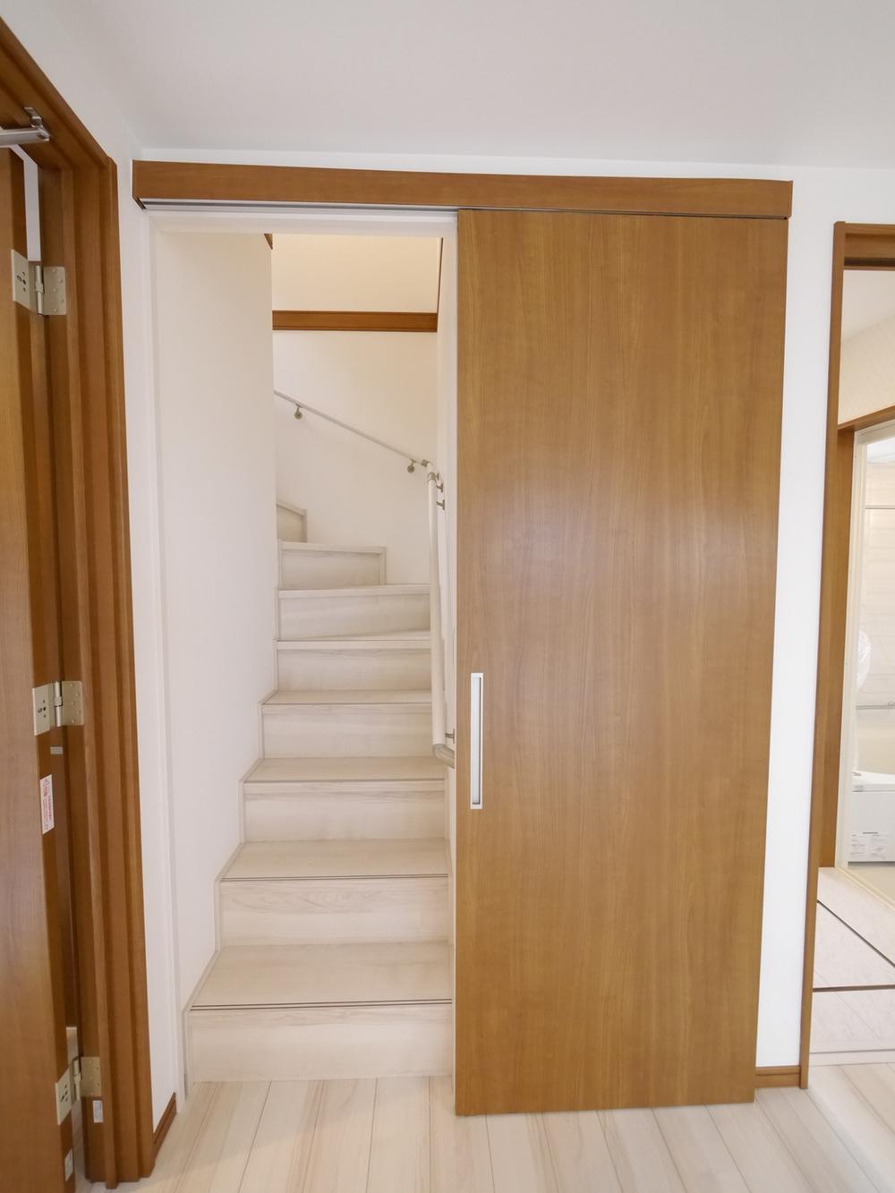 Living. Yet living stairs, With doors that thought the air conditioning. Friendly design considering the people who live. 