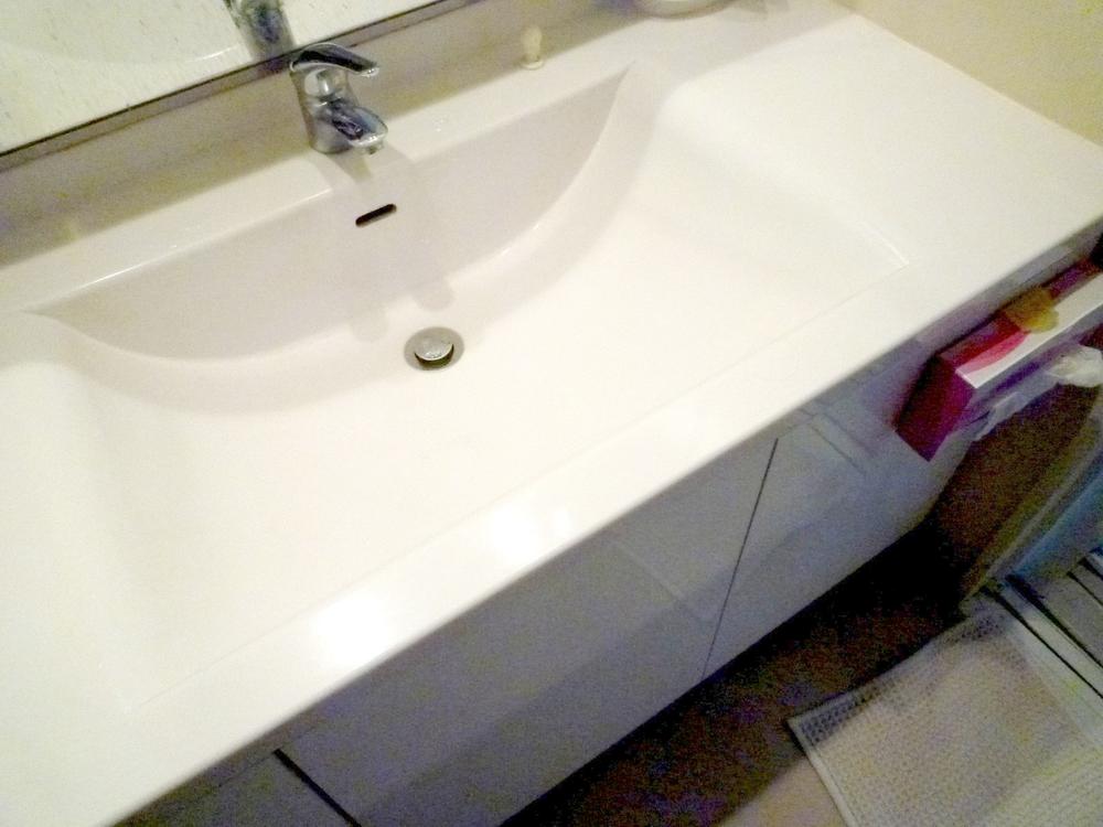 Wash basin, toilet. Clean simple integrated basin ball