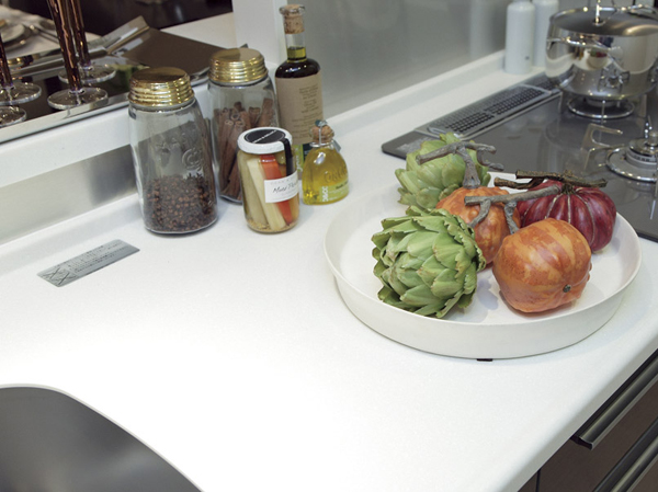 Kitchen.  [Artificial marble kitchen top board] System kitchen ceiling plate using the upscale artificial marble. Strongly to heat, Water wipe is easy to clean dirt is likely to fall just.