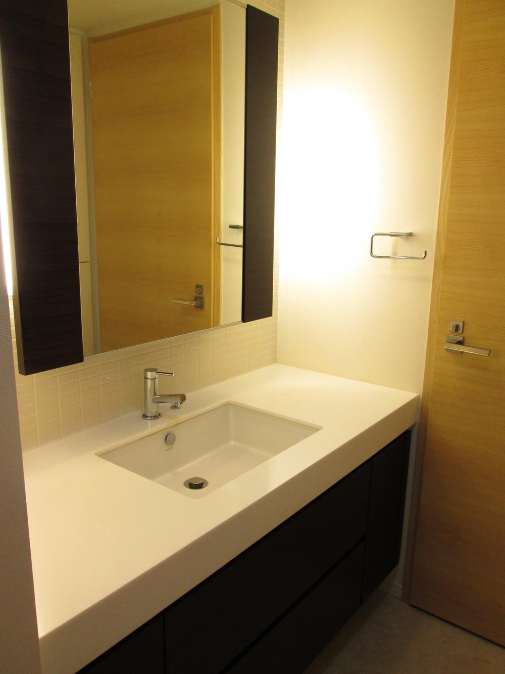 Wash basin, toilet. Wash room with atmosphere