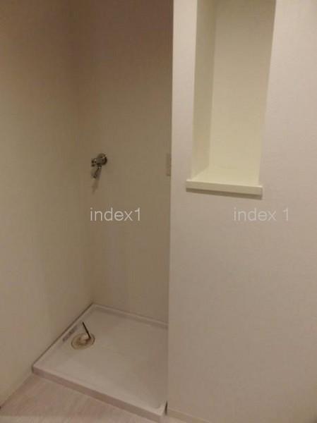 Wash basin, toilet. There is also indoor washing machine Storage!