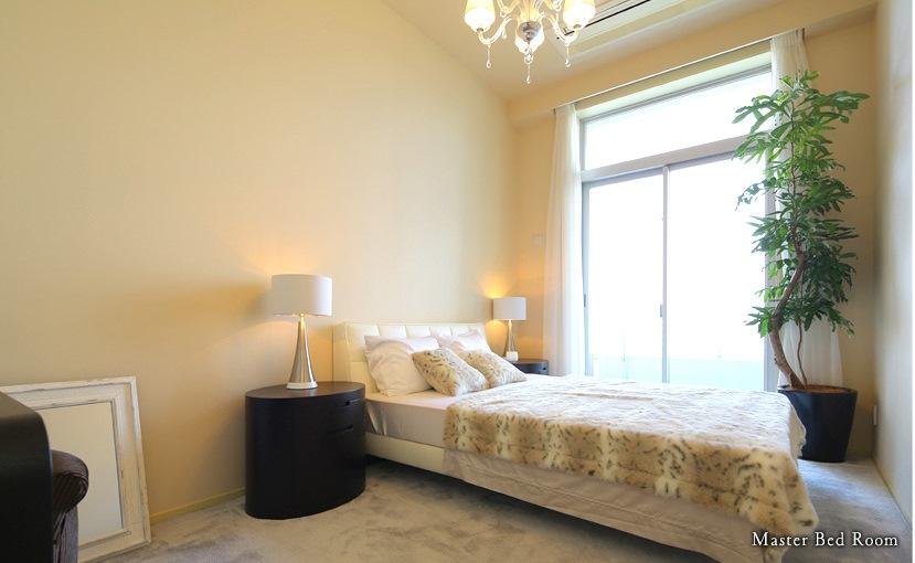 Non-living room. About 9 Pledge master bedroom. Bright and wrapped in soft light.