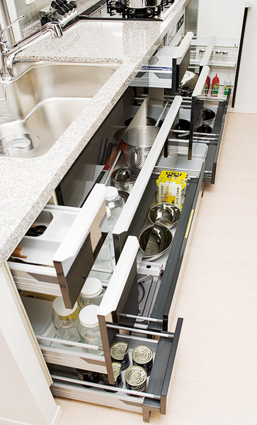 Kitchen.  [Sliding storage that can store plenty] Storage of system kitchens, It can be effectively utilized in the prone cabinet in a dead space, It has adopted a sliding storage.  ※ Except for some