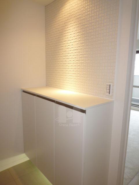 Entrance. Down lights and accent tiles are impressive entrance storage.