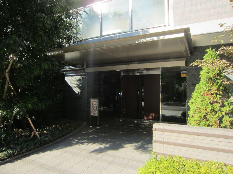 Entrance. The appearance of the entrance, Surrounded by greenery is rich.