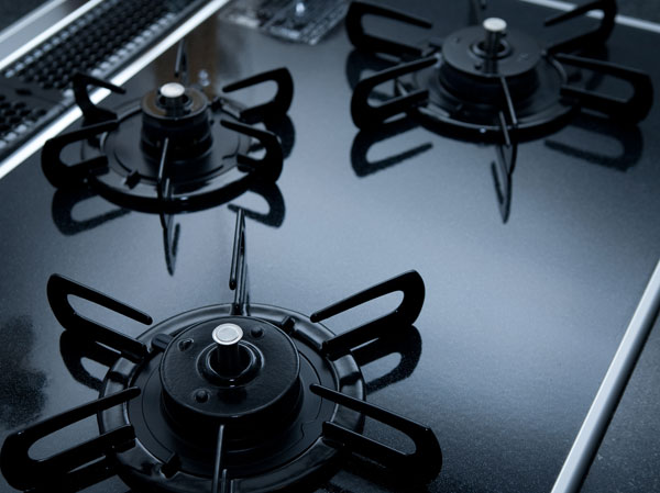 Kitchen.  [Hyper-glass coat the top plate] The top plate adopts material was adhered to glassy tough metal. Strongly to heat and shock, It is easy to clean.