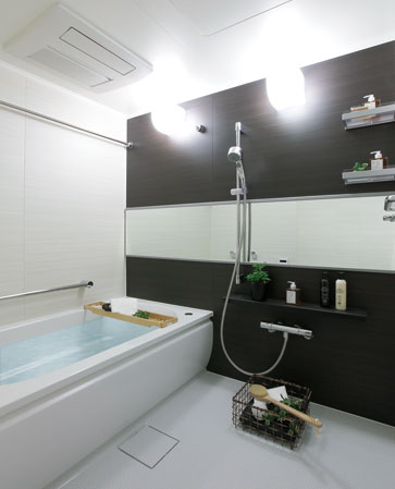 Bathing-wash room.  [bathroom] Bathroom which adopted the fun Mel WA tub a restful and comfortable bathing. And the shape of the straight line and a semicircle becomes a beautiful design also looks, Rim grip that can support the body Ya while bathing, Also equipped with armrest made every elbow.  ※ In the apartment gallery, Bathroom facilities can be confirmed. (The room is different from the one of this sale)