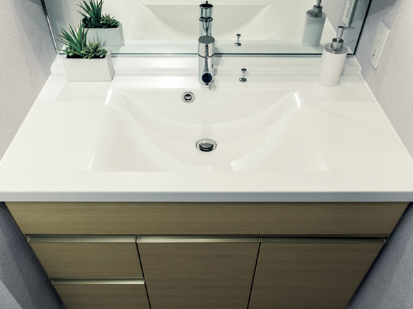 Bathing-wash room.  [Bowl-integrated counter] Counter top and sink bowl of integrally formed, Beautiful and it looks because there is no joint, Cleaning is easy.