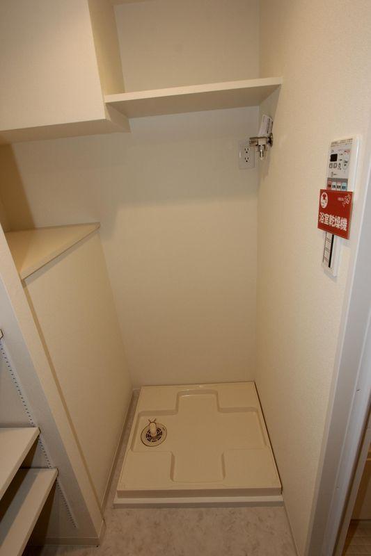 Wash basin, toilet. Washing machine Storage