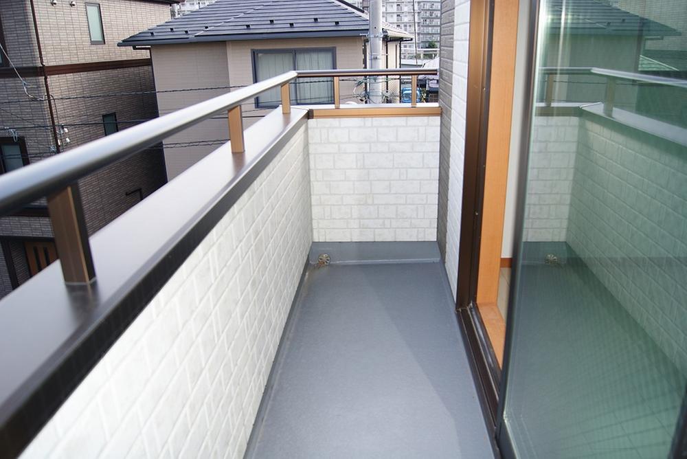 Balcony. Rest assured that there is a handrail