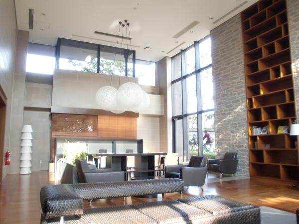 Other common areas.  [Library lounge] Low tables and chairs, Plenty drenched relaxation space with natural light