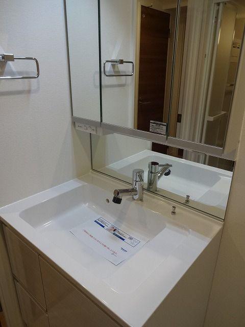 Wash basin, toilet. Bathroom vanity