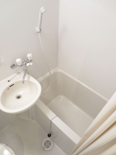 Bath. It is a clean bathroom