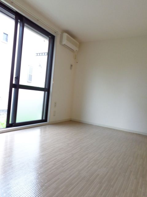 Living and room. It is southwest of the flooring of the room