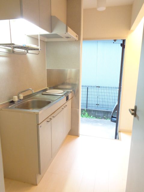 Living and room. Kitchen and rooms are bulkhead. With sliding door