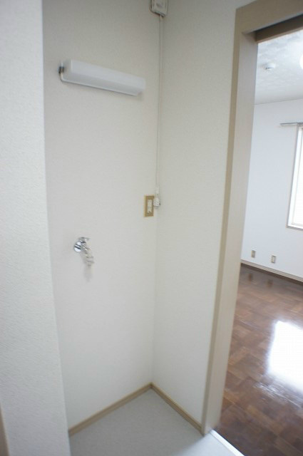 Other Equipment. Washing machine in the room