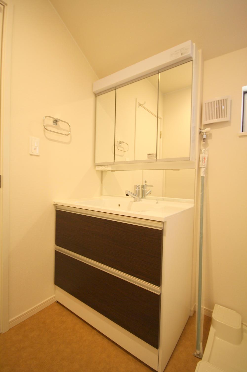 Wash basin, toilet. Local Photos