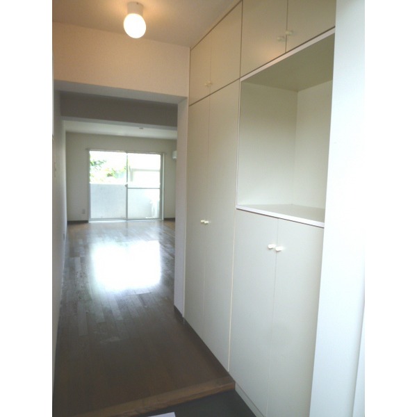 Entrance. Plenty of storage in the front door