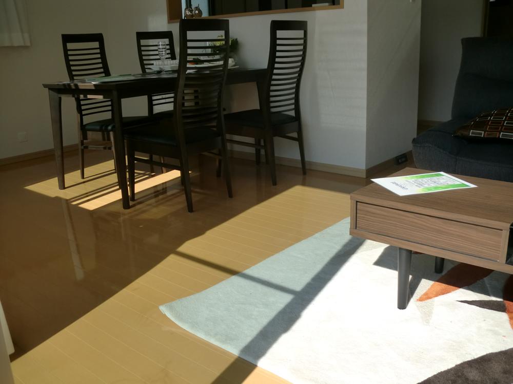 Living. The photograph is an image.