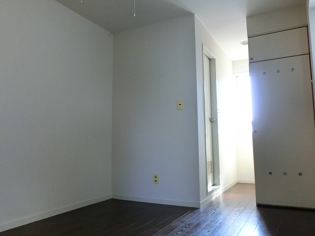 Other room space. It is a corner room.