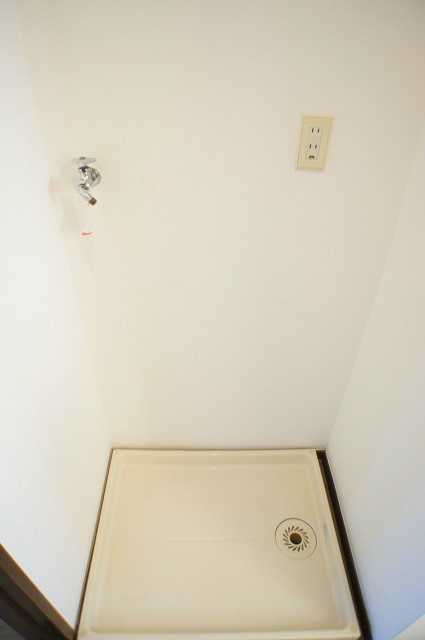 Other Equipment. Washing machine in the room