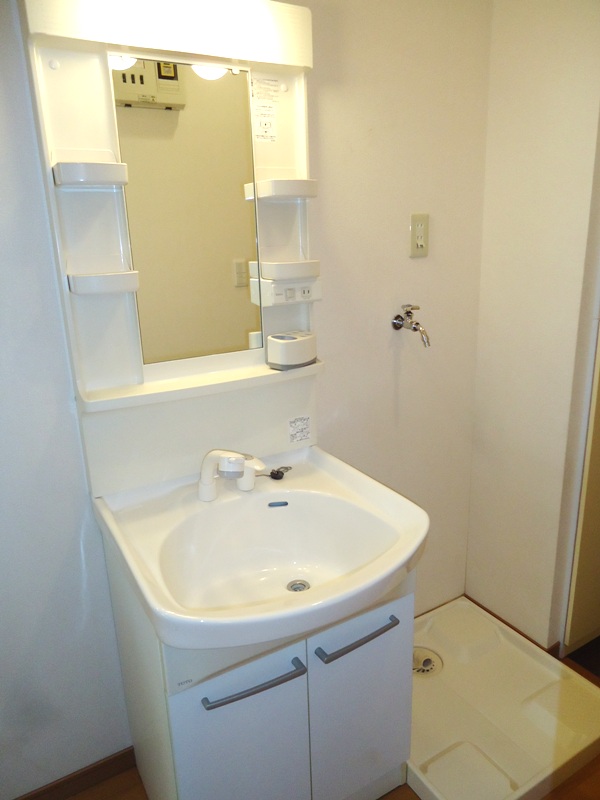 Washroom. And wash basin is independent, A shower.