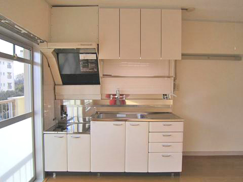 Kitchen. Bright, south side of the window, Kitchen with a hanging cupboard