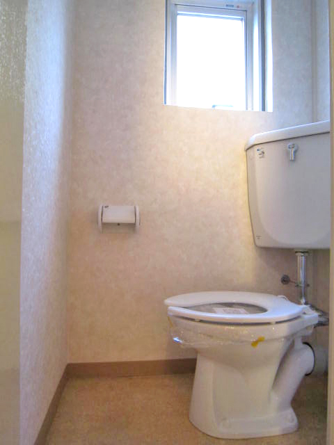 Toilet. With electrical outlet