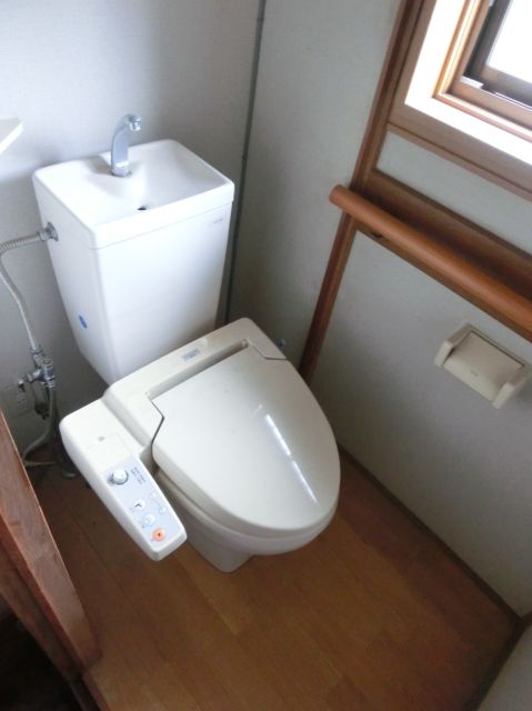 Toilet. Is a toilet which leads from Japanese-style rooms