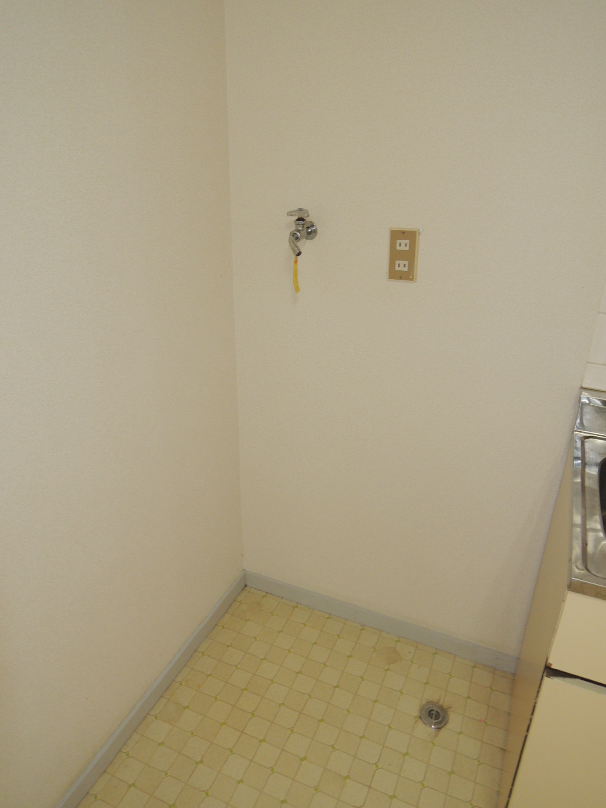 Other room space. Washing machine in the room