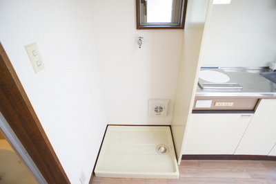 Other Equipment. Kitchen and washing machine inside the room