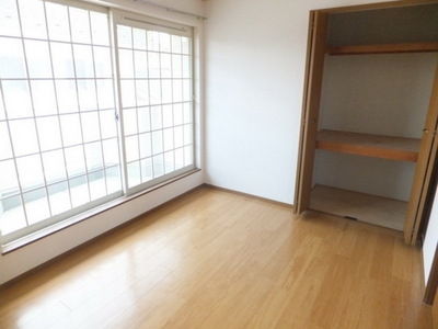 Other room space. A bright room with large windows