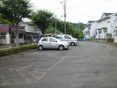 Parking lot. It is an on-site trash Storage