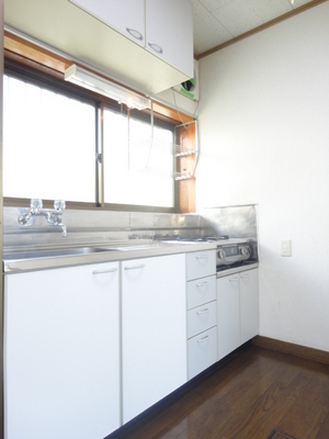 Kitchen. Also easy to kitchen space bright and ventilation have windows