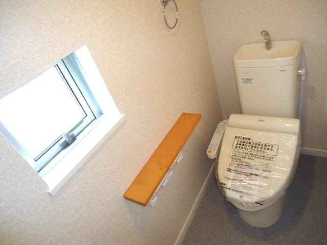 Toilet. Second floor Cleaning toilet that comfortably sit