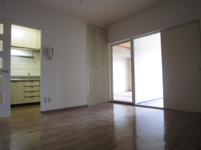 Living and room. It is the same type of image.