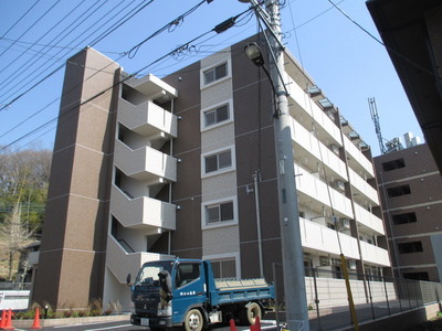 Building appearance. Sunny apartment