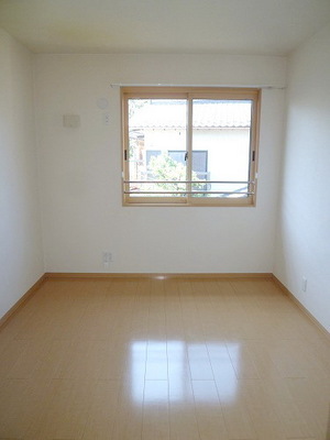 Living and room. Living room is next to the room