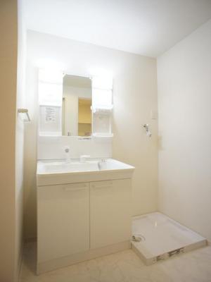 Washroom. A busy morning to happy hair washing basin with vanity