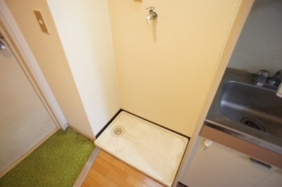 Other Equipment. Washing machine in the room