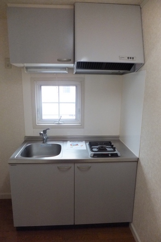 Kitchen.  There is space in the cutting board 