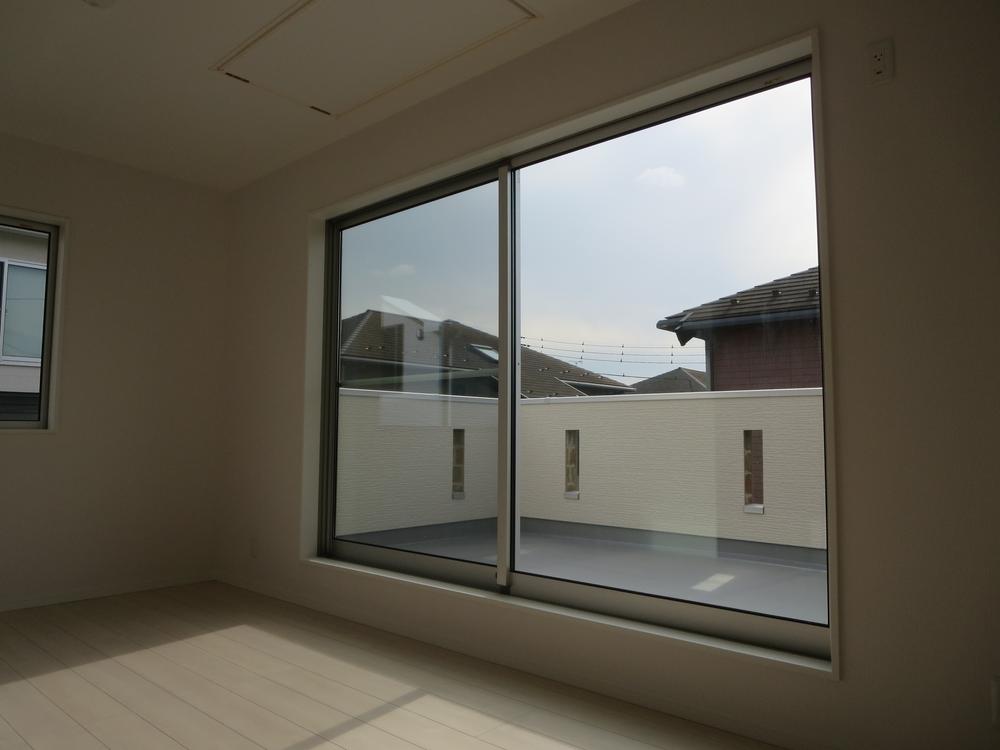 Non-living room. Large balcony is the other side of the window