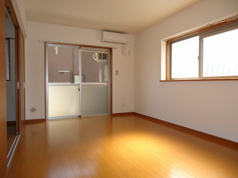 Living and room. The corner is a bay window there is room of the room!