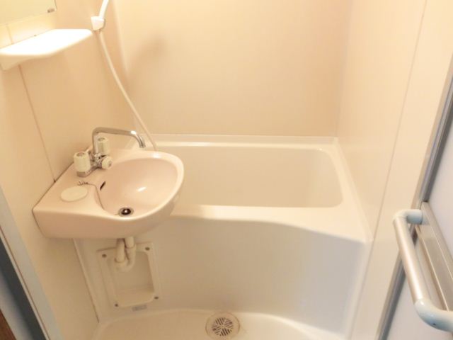 Bath. Is a bath that with wash basin